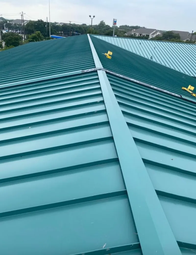 Green commercial metal roof ridge and valley for Metal Roof Repair in Yorba Linda